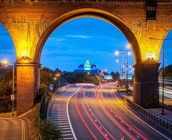 Stockport viaduct lit up at night